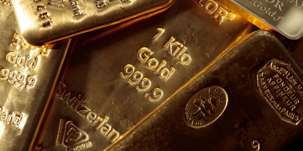 Gold prices finish higher as traders await Fed decision