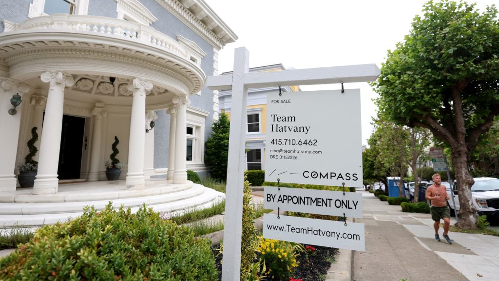 Home sales barely budge from April to May in sluggish spring market