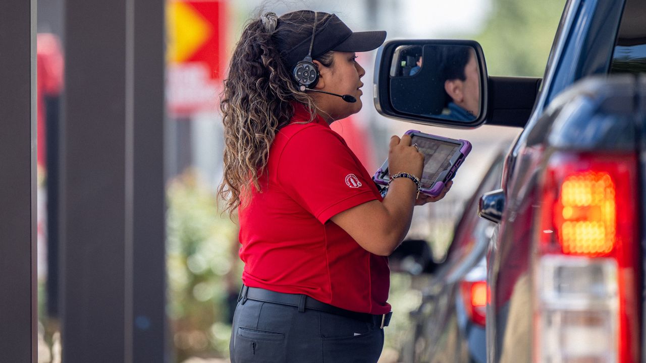 At Chick-fil-A, workers sometimes walk down the drive-thru line and take orders with a tablet.