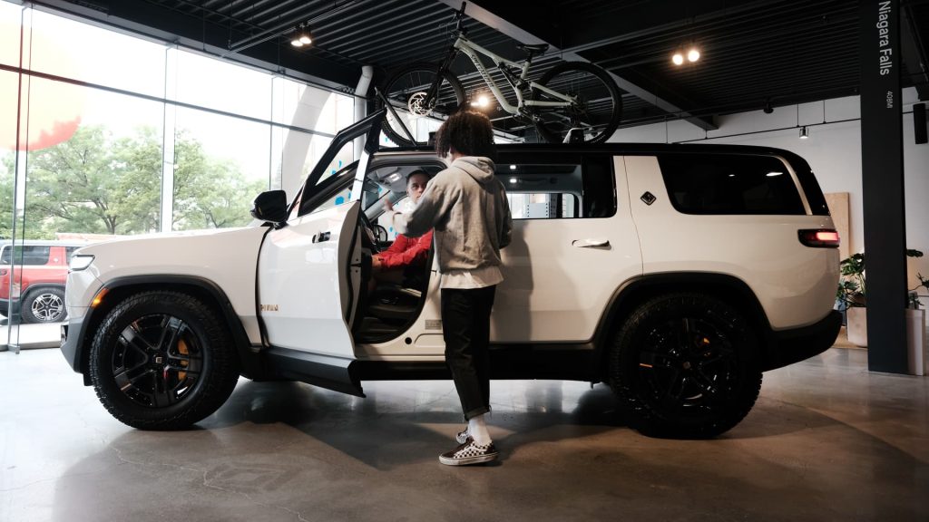 Rivian shares surge as second-quarter EV deliveries top estimates