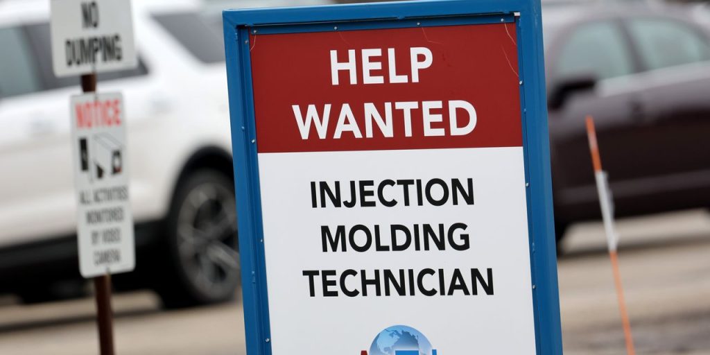 Job openings drop to 9.8 million, but U.S. labor market is still too strong for the Fed