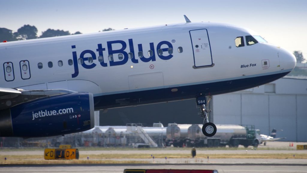 JetBlue cuts forecast on shift to international travel, end of American Airlines partnership