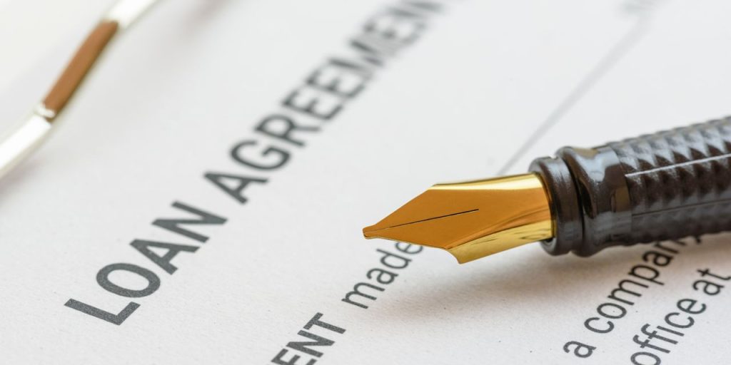 Banks are making it tougher for consumers and companies to borrow money