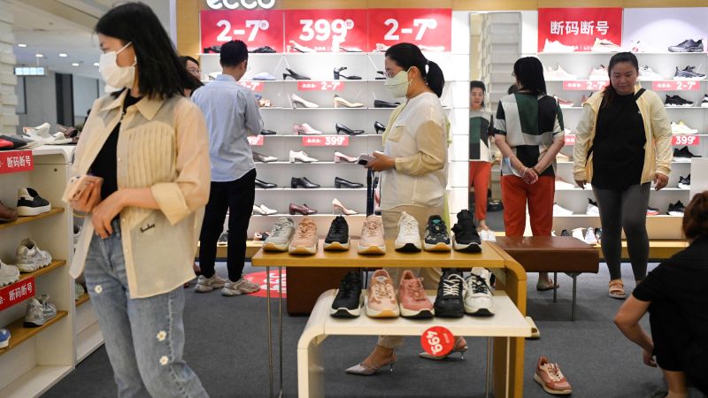 China slips into deflation as consumer prices fall for the first time in more than two years