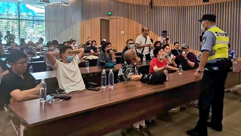 Evergrande’s woes deepen after police detain staff at its wealth management unit