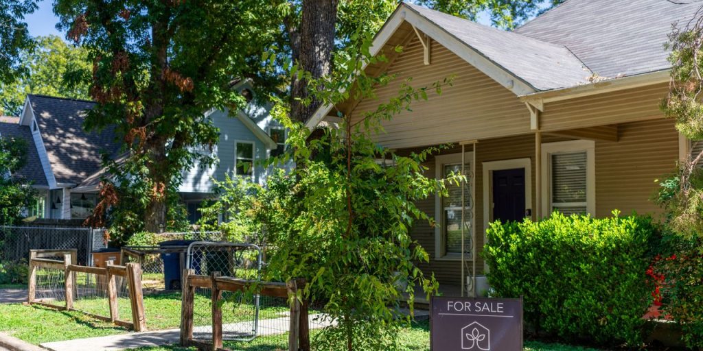 Mortgage rates tick down slightly as Federal Reserve holds rates steady